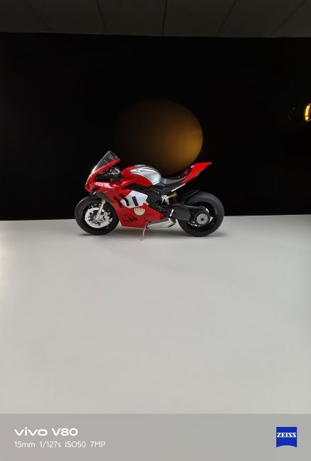 Ultrawide shot of red miniature bike captured on Vivo V80