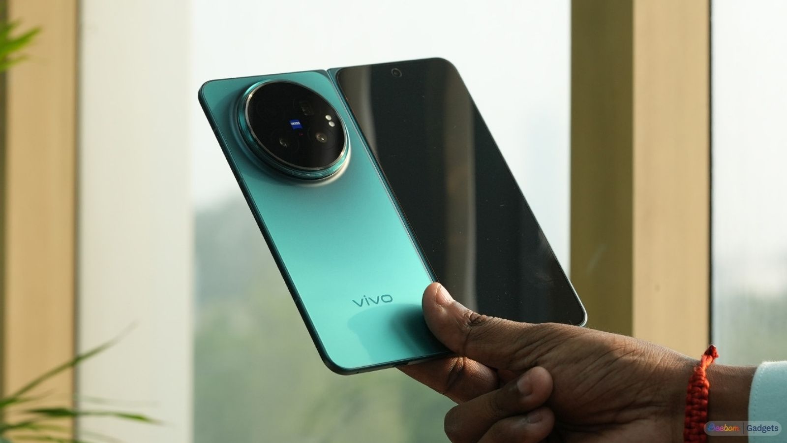 Vivo X Fold 6 back design showcased while unfolded and in hand