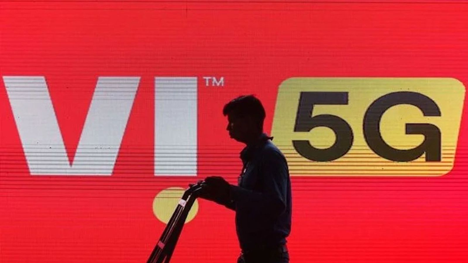 Vodafone Idea stock image with Vi 5G font in the background and a man's silhouette at the front